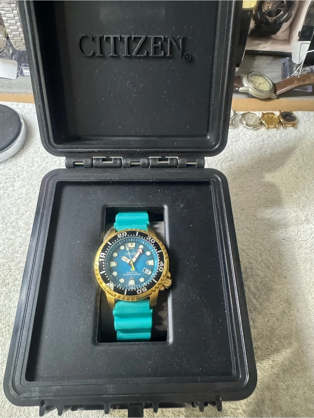 #190 Citizen Blue Dial Diver Watch with Gold-Tone Case and Teal Strap
